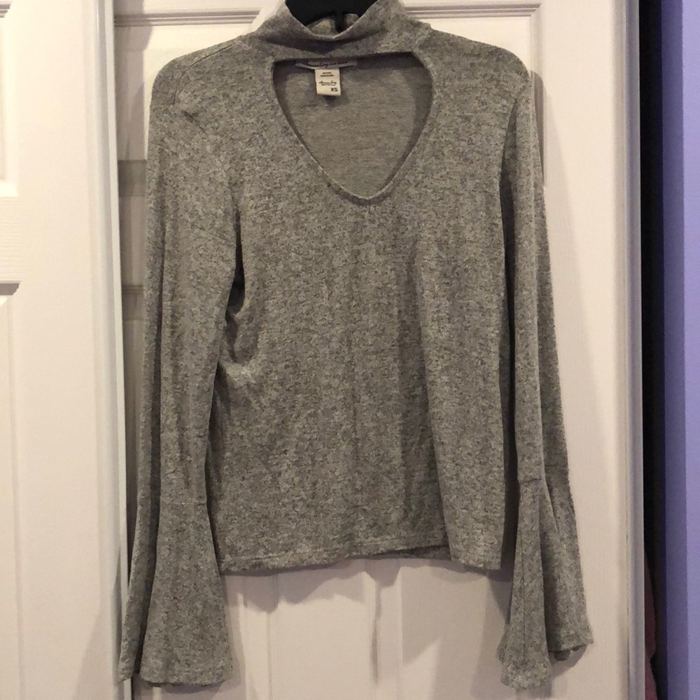 Bell sleeve shirt with chest cutout